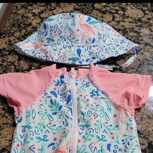 Swimsuit with hat. Rashguard style